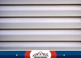 A close up of a white siding.