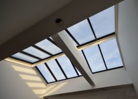 A room with an installed skylight.