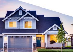 A house with two garages and a driveway featuring the latest advancements in roof technology.