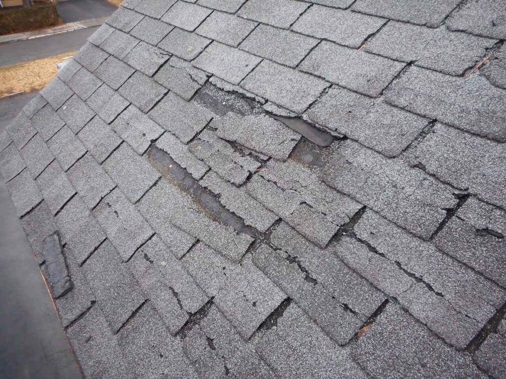 checklist for spring cleaning of the roof- damaged shingles